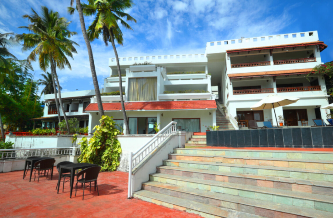 Getaway Beach Resort Kovalam — beachfront infinity pool at dawn
